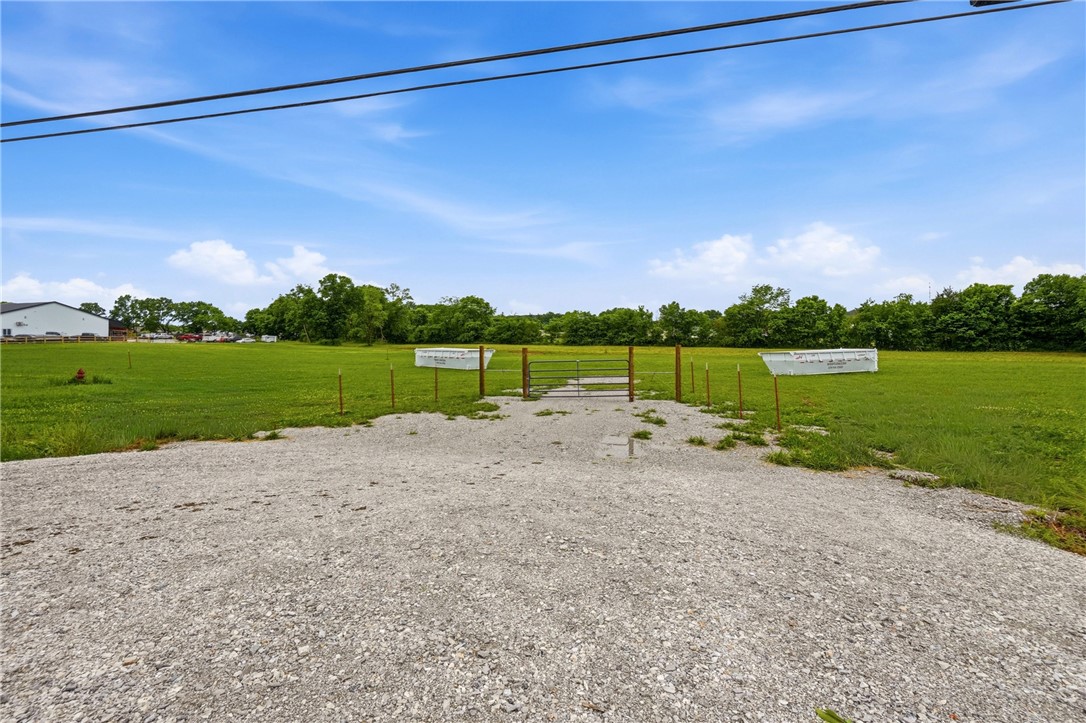 2.36 acres of commercial opportunity inside the city limits of Elkins. Excellent location with visibility and room for future development. A portion of the pasture ground lies in the flood plain, while the remaining property offers a clean slate ready for your new business, shop, office, or investment project. Utilities are available and the property is positioned in the path of continued commercial growth east of Fayetteville. Great chance to secure commercial land in a growing community with strong future potential.