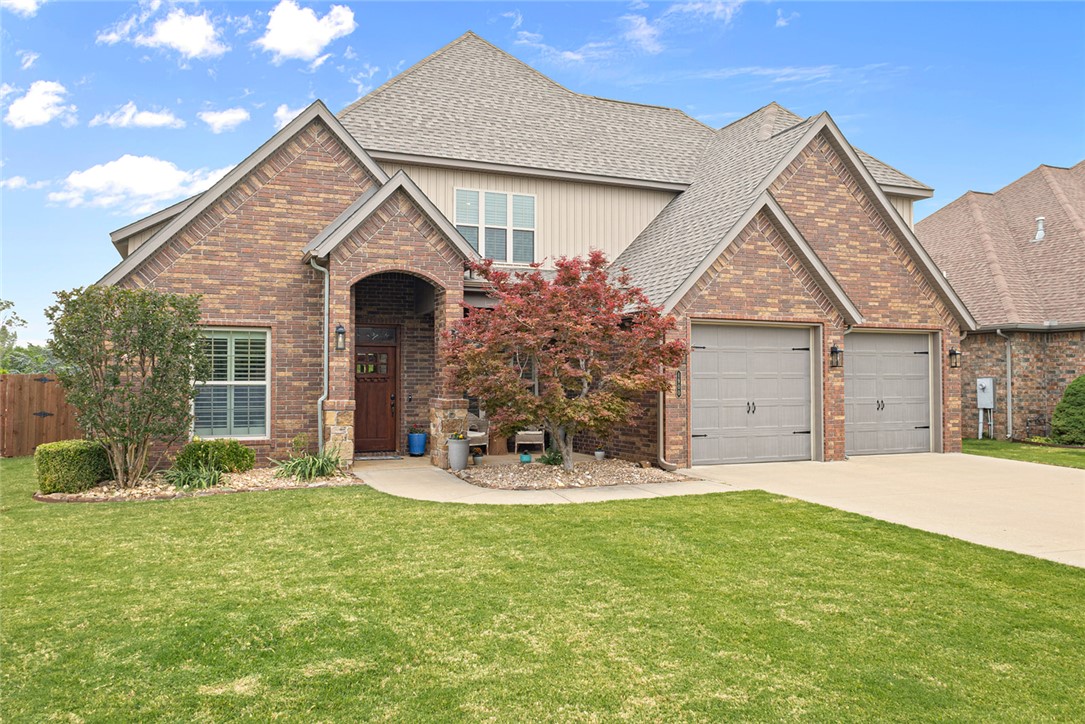 Beautiful Oxford Ridge Home near Schools & Community Center! This 4 Bedroom home features hardwood floors, fresh paint & new roof. Located on an established street in quiet community, beautiful curb appeal welcomes you home. Foyer entry w/French doors leading to spacious home office on left & formal dining space on the right. Spacious living room has vaulted & beamed ceilings along w/a stunning stone fireplace. The kitchen boasts granite counters, large pantry w/antique pantry door, gas range & double oven. Guest bed & bath on main level. Primary suite has hardwood floors & peaceful views, attached bath has large vanity, shower & whirlpool tub along w/a huge WIC. Upstairs bonus room w/wet bar. 2 additional guest beds & a double vanity guest bath. Enjoy private wooded views from your spacious patio. 3-car tandem garage provides ample space. All located in highly sought after central Bentonville!