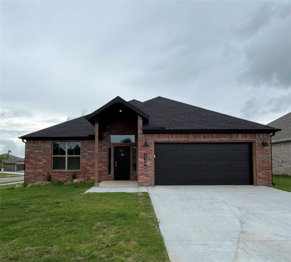 Welcome to Heritage Ranch Phase 4! The “Marjorie” Plan is a stunning new construction home featuring 4 bedrooms, 2 bathrooms, and an open-concept layout connecting the kitchen, dining, and living areas. The living room includes a beautiful fireplace with floating shelves, while the kitchen showcases a large island with 3cm quartz countertops, stylish pendant lighting, and a Frigidaire Gallery appliance package. Additional features include LED disk lighting, durable LVP flooring, a smart thermostat, and keyless entry. The exterior offers brick and Hardie siding, full guttering, and a large covered back patio overlooking a spacious yard—perfect for entertaining or relaxing. This home combines style, comfort, and convenience, located near schools, shopping, dining, and more!