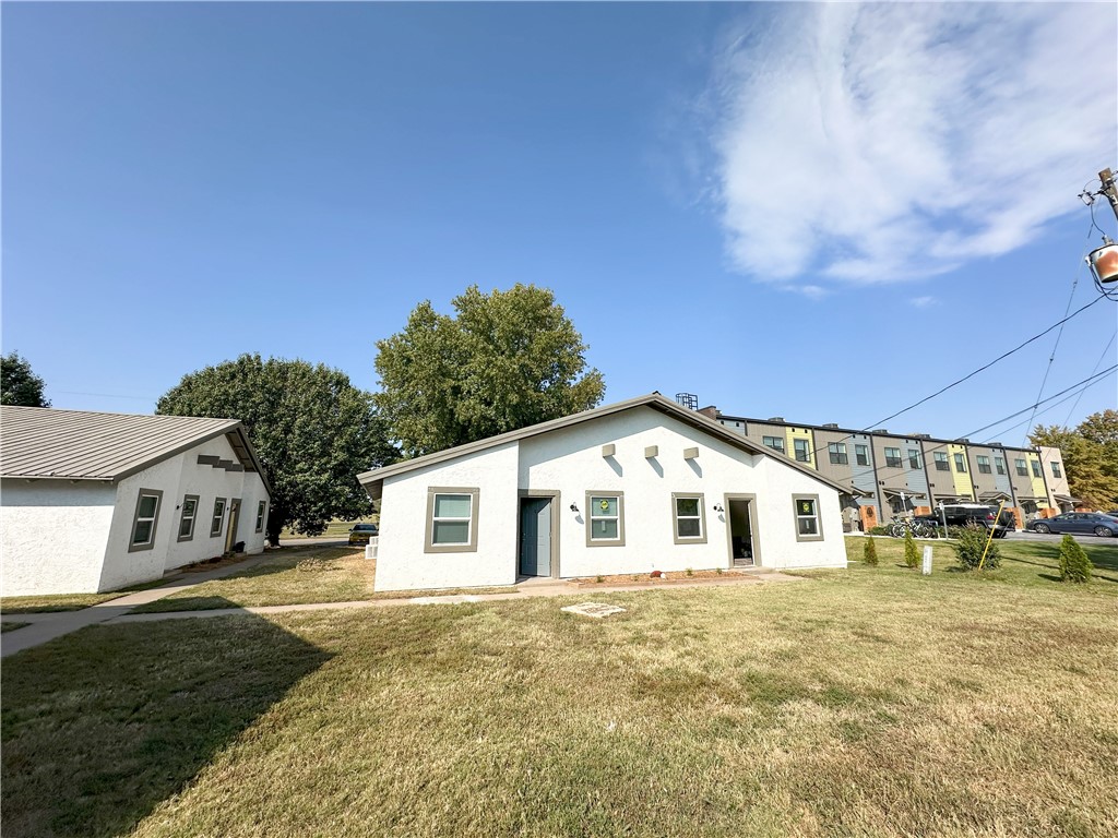 Opportunity Zone eligible.  Located directly east of the newly expanded Luther George Park.  Within walking distance to Springdale's vibrant downtown area which includes restaurants, shops, entertainment and major employers.  The Razorback Greenway trail is located only 200' to the south which connects tenants to all of NWA.  Current ownership has added utility lines on two of the buildings for washer & dryer connections to capture rent premium.  For proven value-add strategy, new owner could do the same on the remaining buildings.
