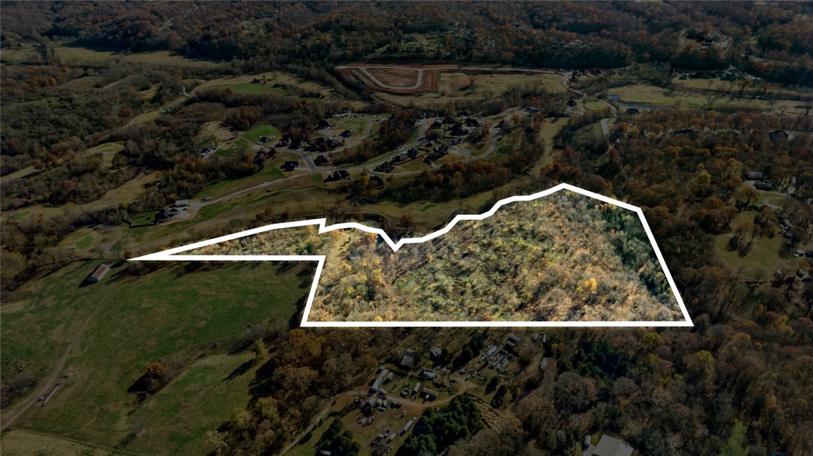 This is your opportunity to capture a highly versatile +/- 29.26 Acre parcel of land with excellent development possibilities fronting The Big Sugar Creek Golf Course in up-and-coming Pea Ridge, Arkansas! The population is booming in Pea Ridge, with population growth in this area expected to FAR outpace the state average and land is selling fast, with beautiful homes going up everywhere, several selling for $400K+! These dynamic parcels are secluded from other homes and overlook the fairway; you will not find a prettier spot to build! Big Sugar Creek Golf Course is a scenic & very challenging 18-hole, Par 72 Champion Golf course that features many amenities such as full a driving range, practice area, an 8,000 sqft putting green, fully stocked pro shop, restaurant & bar, and optional Club Memberships! Act now and start planning to incorporate these unique local features and all the area highlights, that make Northwest Arkansas one of the top-rated locations in the country to live, into your next development plan!