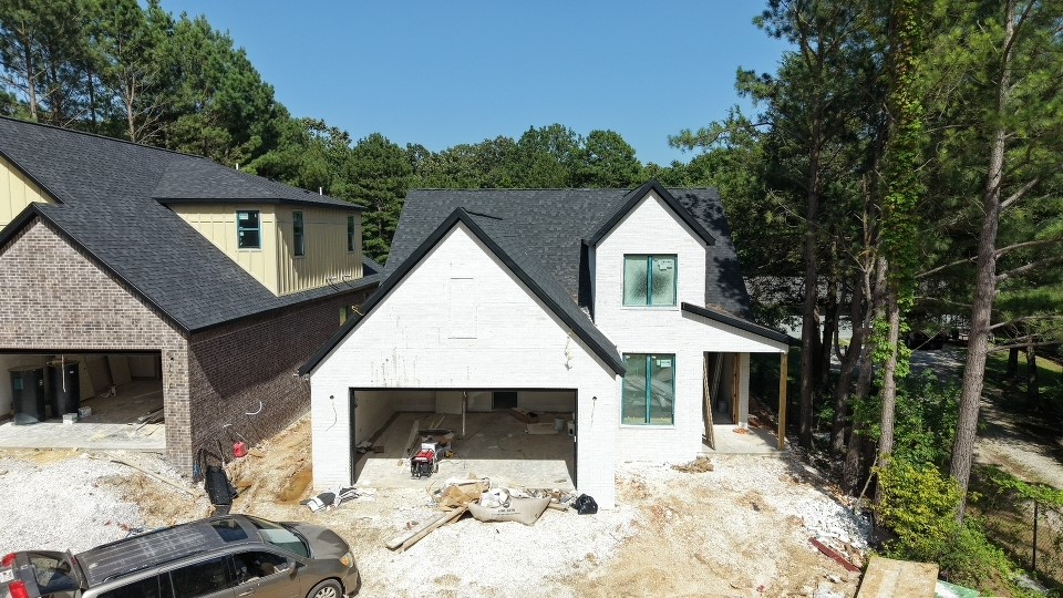 Experience luxury living at 316 S Happy Hollow RD, Fayetteville. This single-family residence, completed in July of 2026, offers a contemporary foundation for your future. With three thoughtfully designed bedrooms, this home provides flexible living arrangements. You must see the primary suite bathroom, which boasts floor to ceiling tile and dual shower heads. The property sits on a comfortable .36 acre lot, offering a large, private, comfortable outdoor space. This property invites you to envision a life of convenience in a newly constructed home.