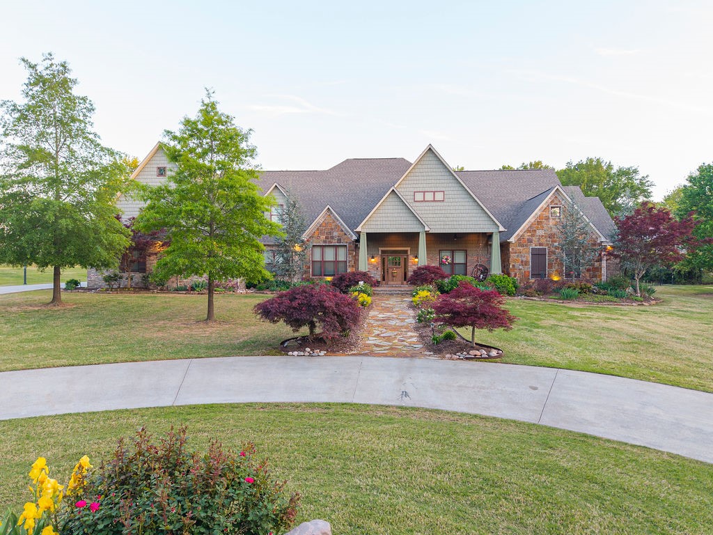 Custom built by Emily Rucker in 2014, this stunning estate is nestled on 2.2 acres & offers 5,734 sq ft of luxurious living space, complete with a rare 4-car garage. The home features 5 spacious bedrooms, 4.5 bathrooms, a private office, & walk-in closets with custom built-in dressers & shelving throughout. The chef’s kitchen is a true showstopper, featuring a built-in coffee bar, double refrigerators, a gas oven, granite countertops, & soft-close cabinetry. The home also boasts a cozy den with gas log fireplace, a theater room with AV closet, a safe room complete with a built-in gun safe, & an infrared sauna/exercise room off the master suite. Step outside to your own private paradise—featuring a sports pool, outdoor living area with full kitchen and refrigerator, fire pit, and a play set perfect for entertaining or relaxing year-round. This one-of-a-kind property offers both everyday comfort and exceptional spaces for entertaining- don't miss the opportunity to call it yours!