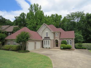UNDENIABLY IMPRESSIVE! This architecturally custom designed residence is nestled on a serene private lot in the back of Craigwood Acres Subdivision. Professional mature landscaping,w/sprinkler sys, grace the exterior of this stately southern home. Interior design lends an air of quality throughout the home w/finishes of 9ft ceilings, custom plantation shutters, & newly installed HARDWOOD & TRAVERTINE FLOORING. Main floor boasts of an elegant entertainer's kitchen w/double oven & a grand island. Master suite features double vanities & a sizable walk-in closet.  Floor to ceiling built-ins in office/4th bdrm w/en-suite bthrm. Upstairs offers 2 large bdrms, bathrm & no lack of storage throughout! HVAC is zoned into 4 sections for energy efficiency. Masterfully maintained & move-in-ready