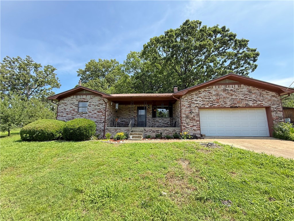 This is a 3 bed 2 bath brick home outside of Harrison, it offers a rural setting and also the convenience of a short commute to town! Featuring bearing fruit trees in the front yard and a spacious backyard this is a great place to roam and enjoy the beauty of the Ozarks.