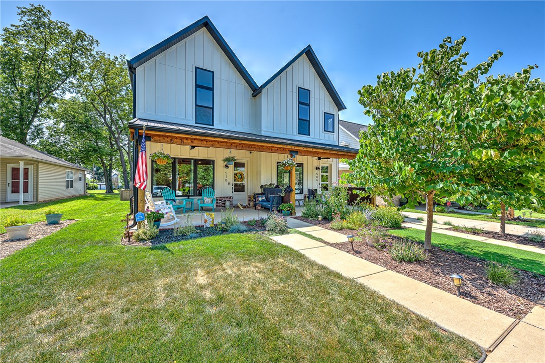 Downtown charming townhome! You will love the layout of this fantastic home! You are greeted with the large front porch, then, out back you will find a wonderful courtyard leading to the detached 2 car garage. The main level has an open concept floor plan with wood floors beautiful kitchen with a large island overlooking the living room and it has a pantry to die for! Also on the main level is a full bath and guest bedroom back entrance featuring outerwear organizer. The upper level has a landing suitable for an office or exercise area etc... Primary bedroom is on second level and offers vaulted ceilings, beautiful bath and spacious closet. Plus 3rd bedroom, bath and the well equipped laundry! Beautiful landscaping, walking distance to all of the downtown festivities!