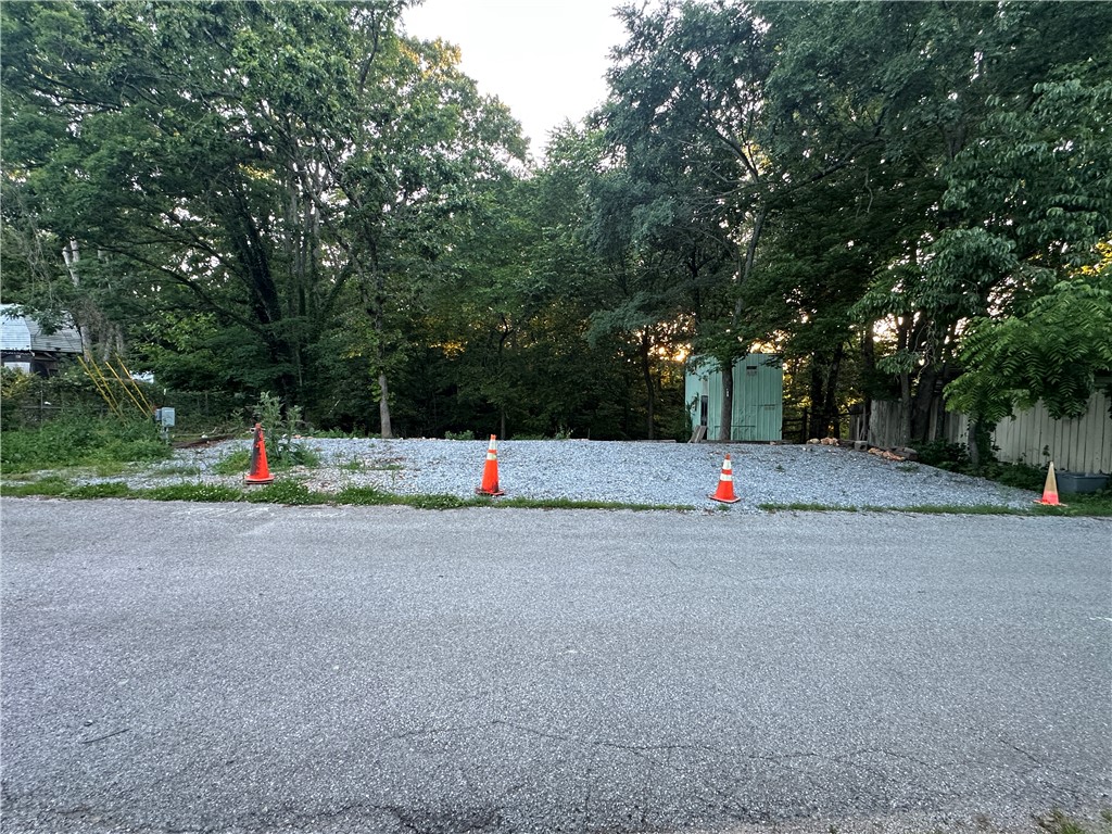 Looking for that spot to do some RV Living at the lake? Look no further! Located in the Pleasure Heights Subdivision means you are minutes away from the water. The property used to have a 12x60 Mobile Home on it but the seller removed it and set up the space for RV Living. They installed full RV hookups with water, electric and utilized the existing two-bedroom septic system. Whether you’re looking for a weekend retreat, full-time living, or affordable lake-area investment, this lot offers a great opportunity with utilities already in place.