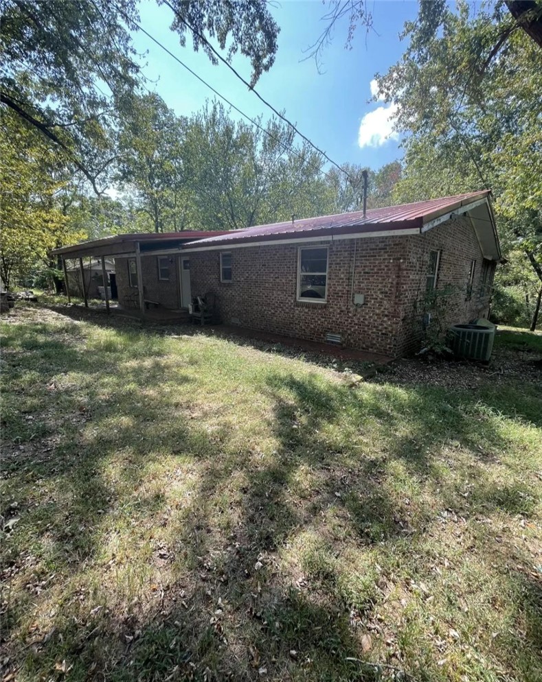 3 bedroom 2 bath home in rural Clarksville. Close enough for quick runs to the store, park or dining but remote enough to feel like you're in the country. Spacious rooms with woods surrounding the property and wildlife abounds. Walk your own trail down to the pond (pond is partially on this property and also on neighbors property) and enjoy the sites of roses, beautiful variegated ivy plants, flowers, and bamboo throughout. Plenty of storage with multiple outbuildings and a partial basement. Multiple fruit trees, and fenced garden ready for your green thumb. Bonus room off the largest bedroom could be used for a blow up Jacuzzi, plant room or so many more options