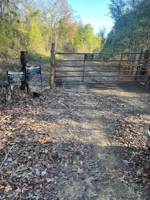 This 81.57 acre +/- wooded property offers a serene and natural setting, ideal for outdoor enthusiasts and nature lovers. The land is covered with a diverse mix of mature trees, providing a peaceful and private environment. Wildlife abounds throughout the area, with frequent sightings of deer, birds, and other native species. Trails wind through the woods, perfect for hiking, hunting, or simply enjoying the beauty of the landscape. With its expansive acreage and rich natural resources, this property presents a rare opportunity for those seeking a retreat or an investment in a lush, undisturbed natural environment. Bordered by land owned and maintained by the Arkansas Game & Fish Commission.