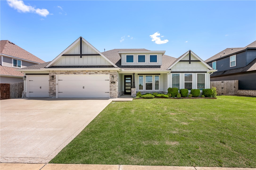 Nestled in the desirable Maple Estates subdivision, this beautifully designed home offers the perfect blend of elegance and functionality. Step inside to soaring tall ceilings, a formal dining room ideal for entertaining, and a thoughtfully designed split floor plan. The spacious primary suite features a spa-like bath with dual vanities, a soaking tub, walk-in shower, and generous closet space. The kitchen offers abundant storage with a walk-in pantry and flows seamlessly into the main living areas. Outdoors, enjoy year-round relaxation on the large covered patio complete with an outdoor fireplace and hot tub that conveys with the property. Conveniently located just 3 minutes from Bentonville West High School, 7 minutes to interstate access, and only 20 minutes to the Walmart Home Office, this home combines peaceful neighborhood living with easy access to everything Northwest Arkansas has to offer.