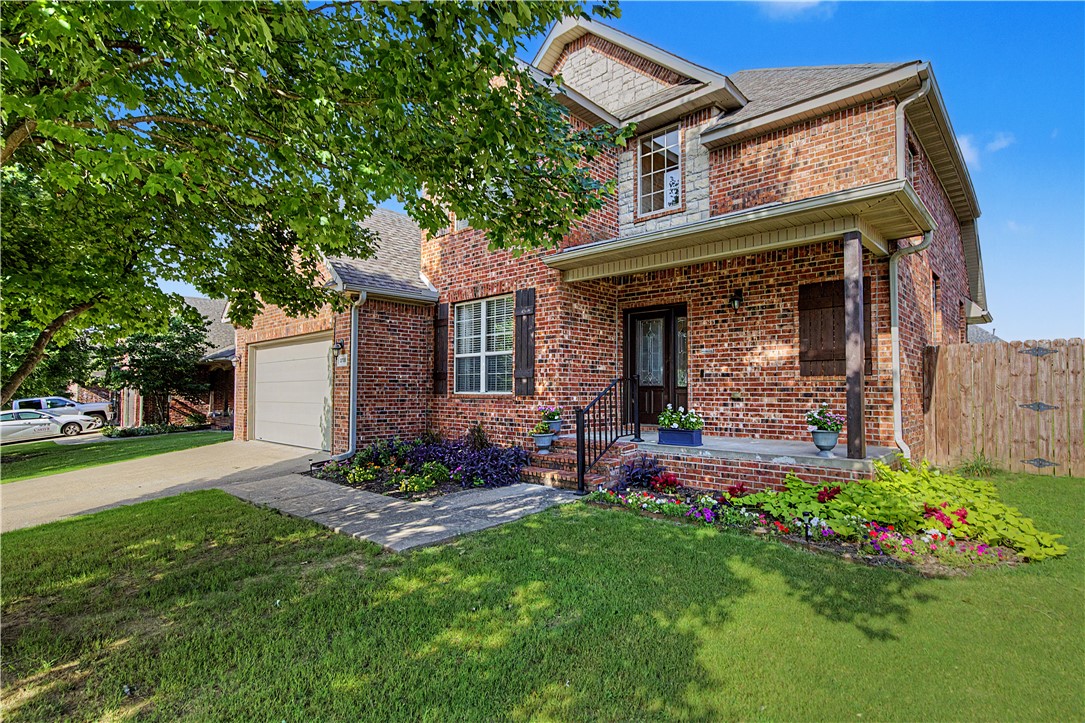 Unbeatable NWA location convenient to I-49, with Fayetteville 12 min. South and Rogers/Bentonville 12 min. North.  This 4-bed, 2.5-bath home features a traditional layout with a dining room and eat-in kitchen that opens to the living room. Updated LVP flooring throughout the ground floor makes life much simpler and easier, and the outdoor entertainment area including pergola and installed grill is a dream.  The other 3 bedrooms are upstairs, the largest of which could easily double for a bonus room or playroom. The mechanicals are new, and it has a new smart garage door opener and smart locks with keycard, code, and fingerprint access (also real keys.) The Razorback Greenway is at the front of the neighborhood, and JB Hunt Park and Hunt Elementary are within walking distance.  Water heater new 12/24, HVAC new 9/24, new LVP flooring 03/24 Hunt Elementary, Hellstern Middle, Central Jr High, Har-Ber High.
