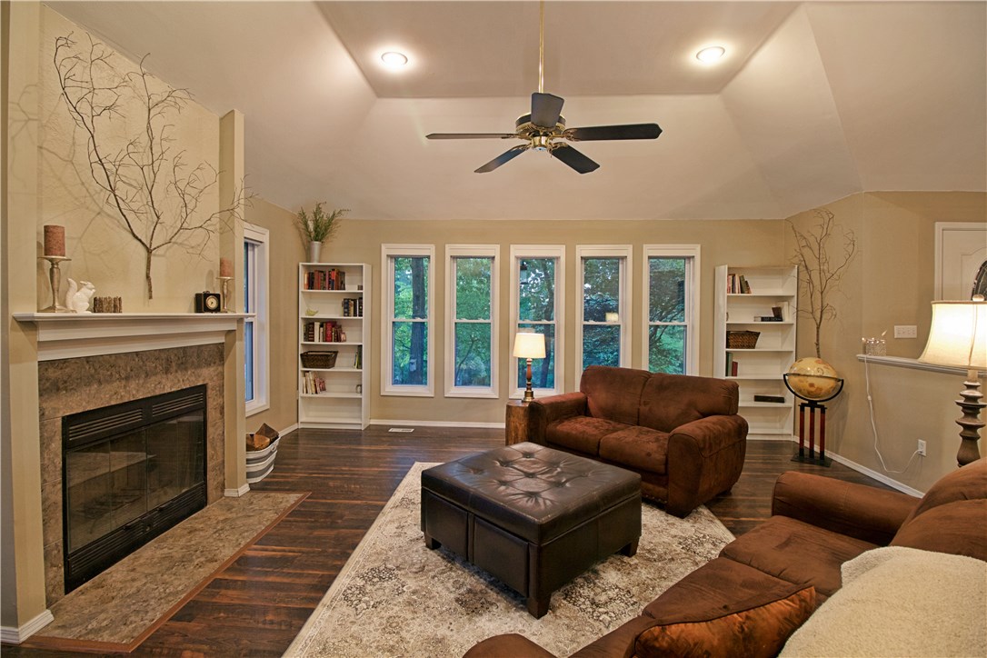 Fabulously updated home on double lot, surrounded by nature, with tons of windows to view it.