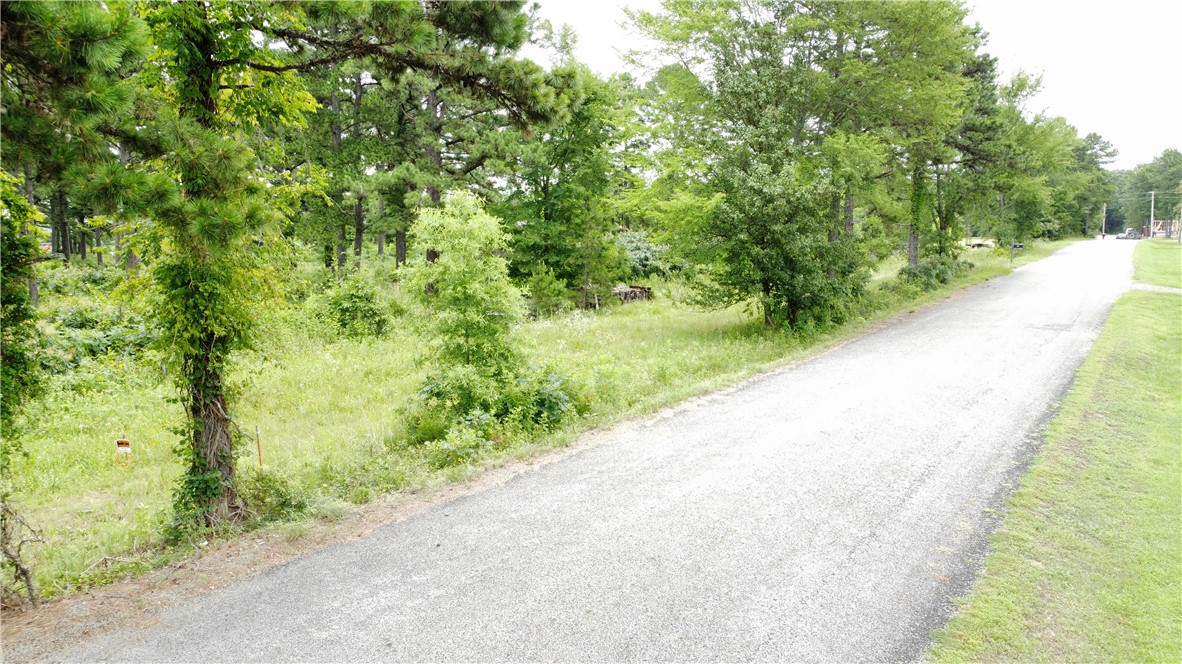 Discover the perfect place to build your dream home on this beautiful 4.72-acre wooded lot off Morgan Road. Nestled in a peaceful, walkable neighborhood, this property offers the ideal blend of privacy and convenience. Mature trees provide a scenic setting and plenty of shade while giving you the flexibility to create the homesite you've always envisioned.

With nearly five acres, there's ample room to play, pets to roam, gardening, or adding a shop or outdoor living space. Enjoy the tranquility of country living while still being just a short drive from nearby amenities. Whether you're ready to build now or invest for the future, this property offers endless possibilities