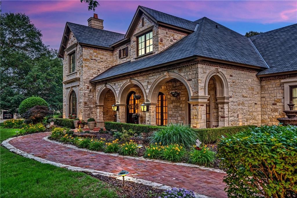 Step into timeless European elegance in this distinctive home featuring stunning hand-carved wood beams that add warmth, character, and architectural charm throughout. Thoughtfully designed bathrooms offer luxurious heated floors, creating a spa-like experience year-round. Situated on a large, beautifully manicured lot, this property provides space, privacy, and endless potential for outdoor living. Conveniently located with easy access to the interstate, major hospitals, top-rated schools, and shopping, this home perfectly balances tranquility and accessibility. Priced below market value, it presents a rare opportunity for buyers to add their own vision and updates while building instant equity—an exceptional home with classic craftsmanship and limitless possibilities