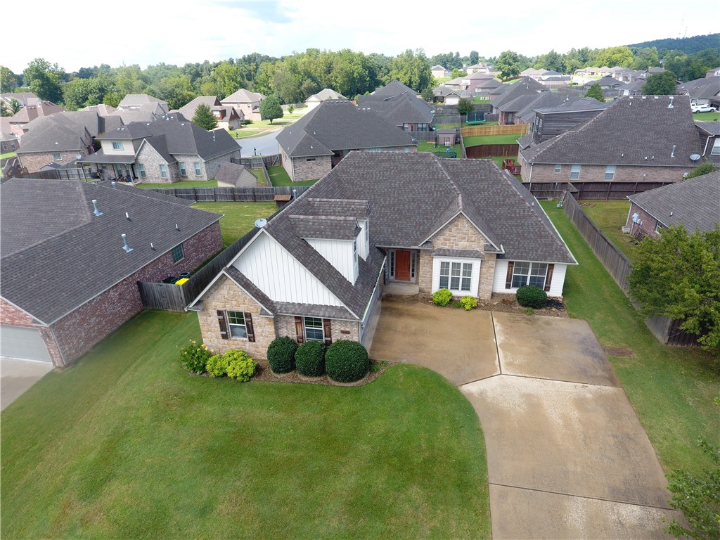 This is a well maintained house ,Split Master  floor Plain , Side load Garage , tall ceilings with lots of crown molding  thought out,bonus room over Garage,  the J.B.Hunt School  1/10 mile away , NWA bike trail at the entrance to the Spring Hills Area . House can be shown after the 4-6-2019 date . Renter will be out .