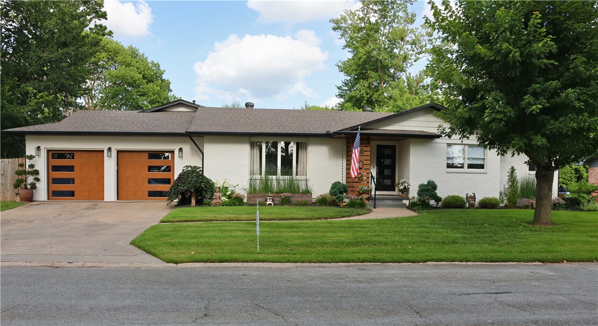 Welcome to this beautifully updated 4-bedroom, 3.5 -bathroom home located on a quiet street with wonderful neighbors, just minutes from the Square.  Completely remodeled in 2022 this home offers modern upgrades, thoughtful design, and incredible outdoor living! The extensive renovation included major system upgrades such as a new HVAC system, all new electrical , and new plumbing all the way to the street. Inside you'll find a gorgeous kitchen featuring custom cabinetry, granite countertops, a large center island and plenty of space for cooking, gathering and entertaining.  With 2 spacious living areas, there is room for everyone to relax and enjoy. Primary suite even includes built in storage. Outside, enjoy your own private backyard retreat complete with in ground heated pool, hot tub and a convenient full bath.  The property also includes a garden shed with chicken coop and an enclosed chicken run - perfect for hobby gardening or fresh eggs. This home truly has it all!