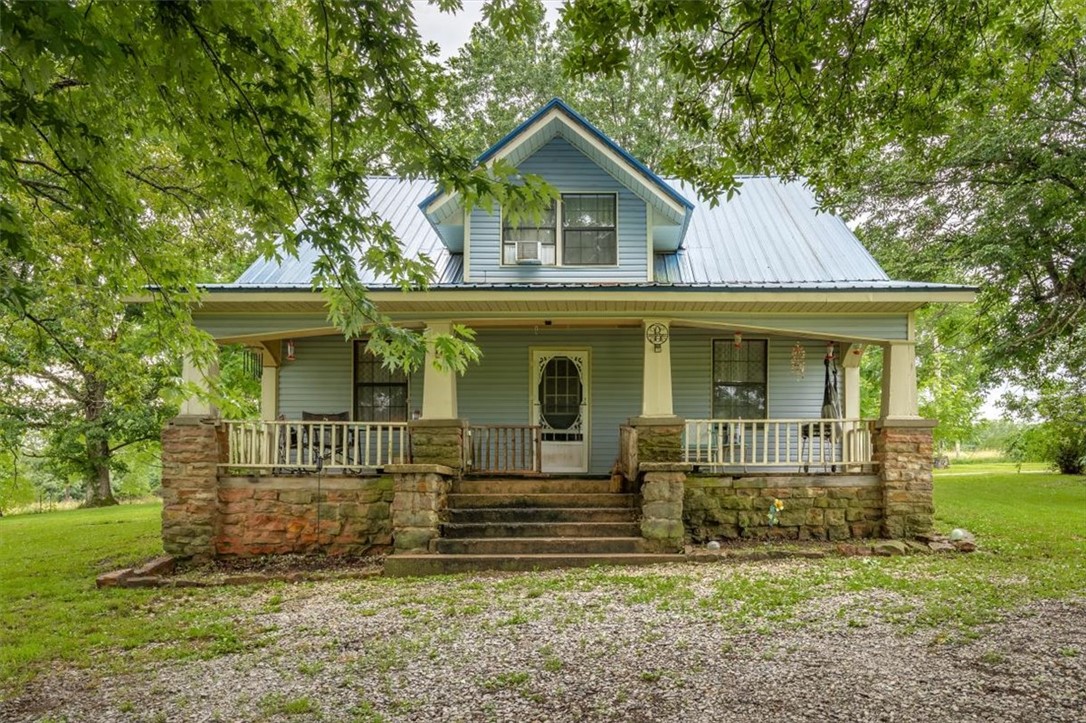 You have to see this one to appreciate everything it has to offer! This beautifully remodeled 4-bedroom, 1-bath home has been updated from top to bottom while maintaining its timeless country charm. The interior features epoxy countertops, new plumbing, updated electrical, modern lighting, and quality finishes throughout, making it completely move-in ready.

Situated on approximately 5 acres, this property offers the perfect blend of peaceful country living and functionality, with plenty of room for a hobby farm, livestock, gardening, or simply enjoying the open space. A standout feature is the massive 60x80 shop with 6-inch concrete floors, providing endless opportunities for storage, equipment, hobbies, or a home-based business. The home is currently on city water but can easily be converted to a private well if desired.

If you've been searching for a fully updated home with acreage, a large shop, and the quiet lifestyle you've been dreaming of, this is a property you won't want to miss,