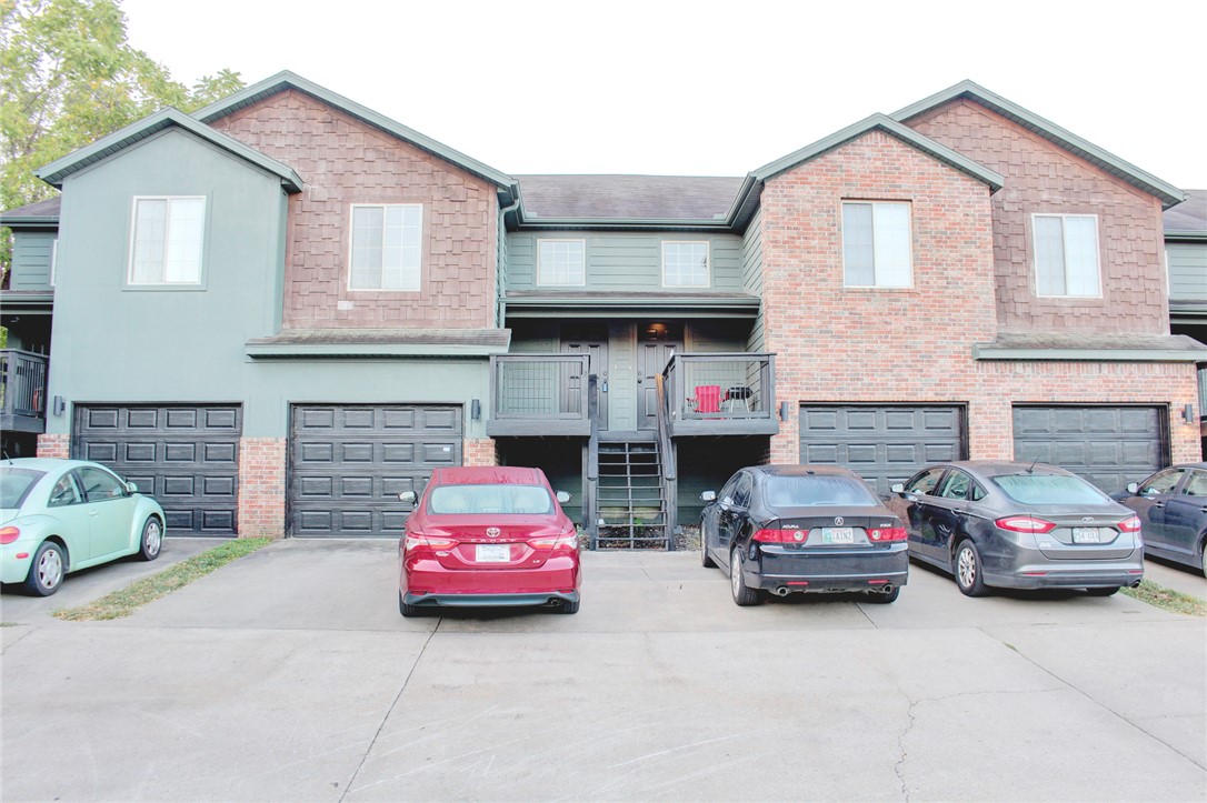 Convenient Condo to the University of Arkansas and adjacent to the new City Park with outside eating and entertainment. With three bedrooms, two bathrooms, all electric, open living/kitchen floor plan, and one car garage this is a rare find this close to the University and next to the trail system. Agent Owned. Have more than one unit that can be purchased. The photos are not necessarily of the unit listed.