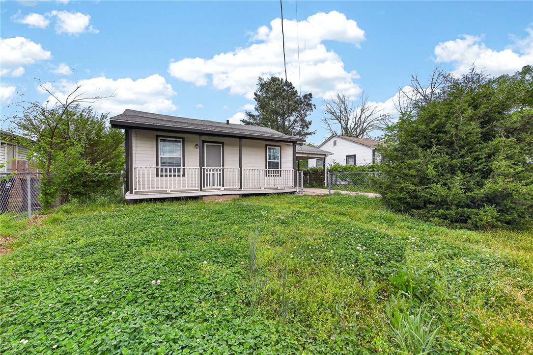 Investment Opportunity in Rogers! Conveniently located just east of Rogers High School and north of the Tyson plant, this property offers excellent potential for investors, renovators, or buyers seeking a project. The home features 874 SF which includes 2 bedrooms, 1 full bath, a Family Room, Kitchen, Laundry Room, attached carport, and a detached one-car garage. Please note that all kitchen appliances have been removed. House can be inspected. However, it is being sold “as is”, and no repairs will be made by the seller. A water pipe froze during the winter and was repaired by a plumber. Receipt will be provided. Water is turned off at the street, but will be turned on for inspection. This is an estate property, so please allow 48-hour expiration of all offers. This is a great opportunity to add value in a convenient Rogers location, but is not likely to be able to be financed.