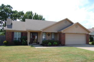 Situated on a culdesac this home has fresh paint and new carpet throughout!  Enjoy the spacious kitchen area or the large living area with fireplace.  With additional storage building out back you won't be disappointed with this one priced at 139,000.