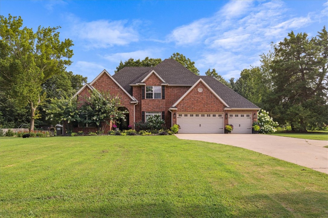Welcome to your own private retreat! Nestled on approximately 2 beautiful acres surrounded by mature trees, this stunning 4-bedroom, 2.5-bath home offers the perfect blend of comfort, space, and tranquility. Inside, you'll find a thoughtfully designed floor plan featuring a spacious dining area and a dedicated media room that's perfect for movie nights, entertaining, or relaxing with family.
Step outside to your backyard oasis, complete with a sparkling in-ground pool, a covered patio ideal for year-round outdoor living, and a charming greenhouse for gardening enthusiasts. The peaceful, wooded setting provides privacy while still being conveniently located.
Situated in the highly sought-after Bentonville School District and just 20 miles from Downtown Bentonville, this property offers the best of both worlds—a quiet country escape with easy access to world-class dining, shopping, biking trails, and all that Northwest Arkansas has to offer. 
This exceptional property is one you won't want to miss!