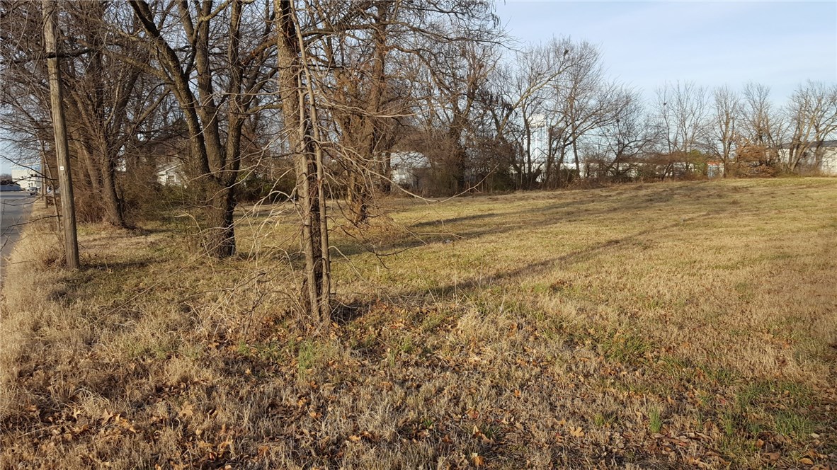 1.64 Acre lot zoned R-3.  Fenced on 3 sides with trees on borders.  Good location for small multi family development.