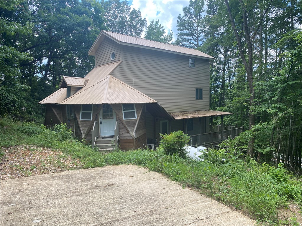 This 3BR 2.5BATH home on 1.09 ac is in beautiful Newton County in the Buffalo National River region of the Ozark Mountains of Arkansas. Perfect location being only 1 mile from the historic Jasper Square (eating, shopping, services, library), Bradley Park (on the Little Buffalo River, pickle ball, swimming) & Jasper School. Perfect for your primary home, vacation home or used as a nightly rental. Features include vinyl and wood siding; metal roof and deck overlooking the Little Buffalo River Valley. The property is located just 8 miles from the Hasty Public Access & only 8 miles from the Pruitt Access of the Buffalo National River for canoeing & fishing. Located in Newton County & Heart of the Ozark Mountains. Near the Ozark National Forest which provides many recreational opportunities to include hiking, hunting, horseback riding, bike riding or ATV riding.