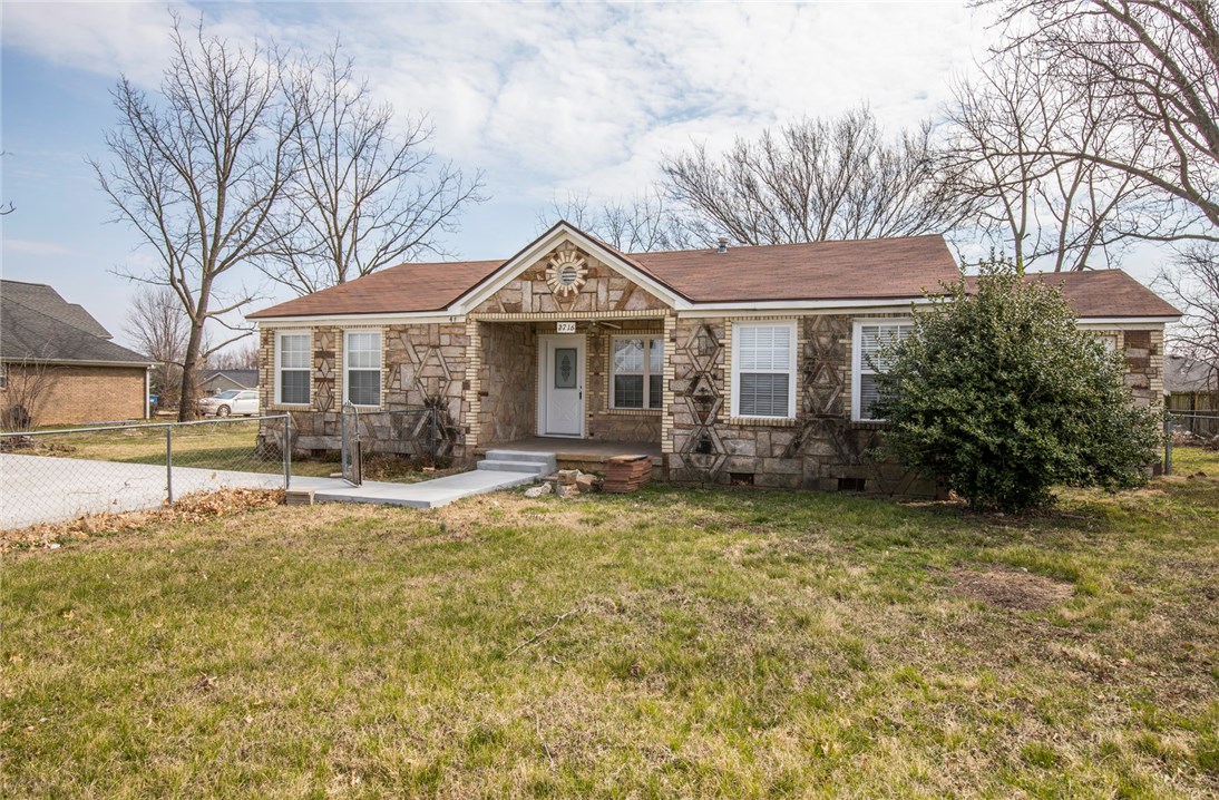 Country charm in the city, just minutes from I-49 and City parks and trails. This home has 4 bedrooms and 2 baths, hardwood flooring throughout, lots of storage, fenced in yard area. Refrigerator is included.
