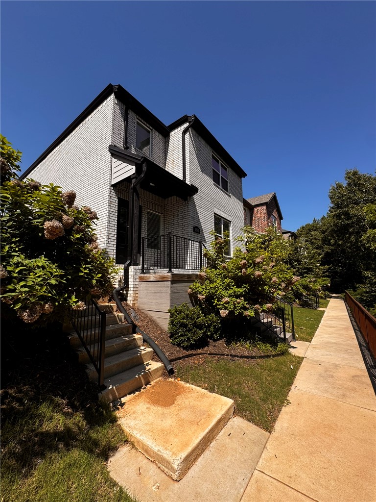 Beautiful 2022-built, 4-bedroom, 2.5-bath two-story townhome located in Fayetteville. Sagely Place is within walking distance of the highly rated Fayetteville Athletic Club and offers easy access to the Razorback Greenway, Lake Fayetteville, the Botanical Garden of the Ozarks, and nearby shopping. The home features a rear-entry garage facing Amherst Alley, while the front porch overlooks a peaceful wooded lot with winter views of the pond for added privacy. The versatile 4th bedroom could also make a great bonus or media room. The kitchen comes fully equipped with a dishwasher, gas range, microwave, and refrigerator for added convenience.** NO PETS - Unit requires a stackable washer and dryer**