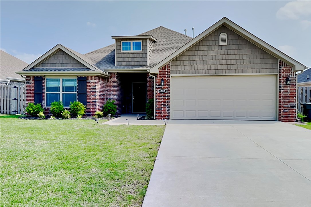 Welcome home to this stunning 3-bedroom, 2-bath residence in the highly sought-after Villages of Sloanbrooke, ideally located just minutes from the University of Arkansas and I-49. Built in 2020, this 1,615 sq. ft. home boasts a spacious open-concept design featuring high-quality finishes like granite countertops, wood-look ceramic tile, and elegant crown molding throughout.
The expansive living room serves as the heart of the home, anchored by a cozy gas fireplace that flows seamlessly into a chef’s kitchen with ample counter space and sleek stainless steel appliances. Retreat to the master suite, which offers a private sanctuary complete with a jetted whirlpool tub, walk-in shower, and a generous walk-in closet. Step outside to your fully fenced backyard and take in the views from the covered patio.
Bonuses: The refrigerator, washer, and dryer all convey and there is no carpet in the home!
View the virtual tour now and then schedule your in-person viewing!