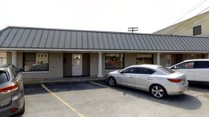 Nice commercial building with Hwy 65 B frontage; currently used as professional offices; lower level includes kitchen/break room area; This reasonably priced building would be a great investment or business venue; good traffic due to major thoroughfare frontage; current long term renter; consists of two suites rented together at the moment