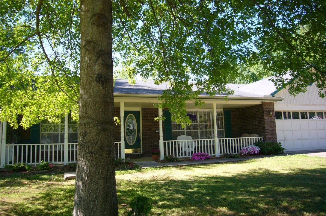 Level & lovely 1 acre (M.O.L.) with back lawn entertainment deck & ample garden space. Striking interior with tile, wood & new carpet flooring. Spacious kitchen & dining with focal point window. Wood burning fireplace in living room is plumbed with gas. New paint and CH & Air. Walking distance to school.