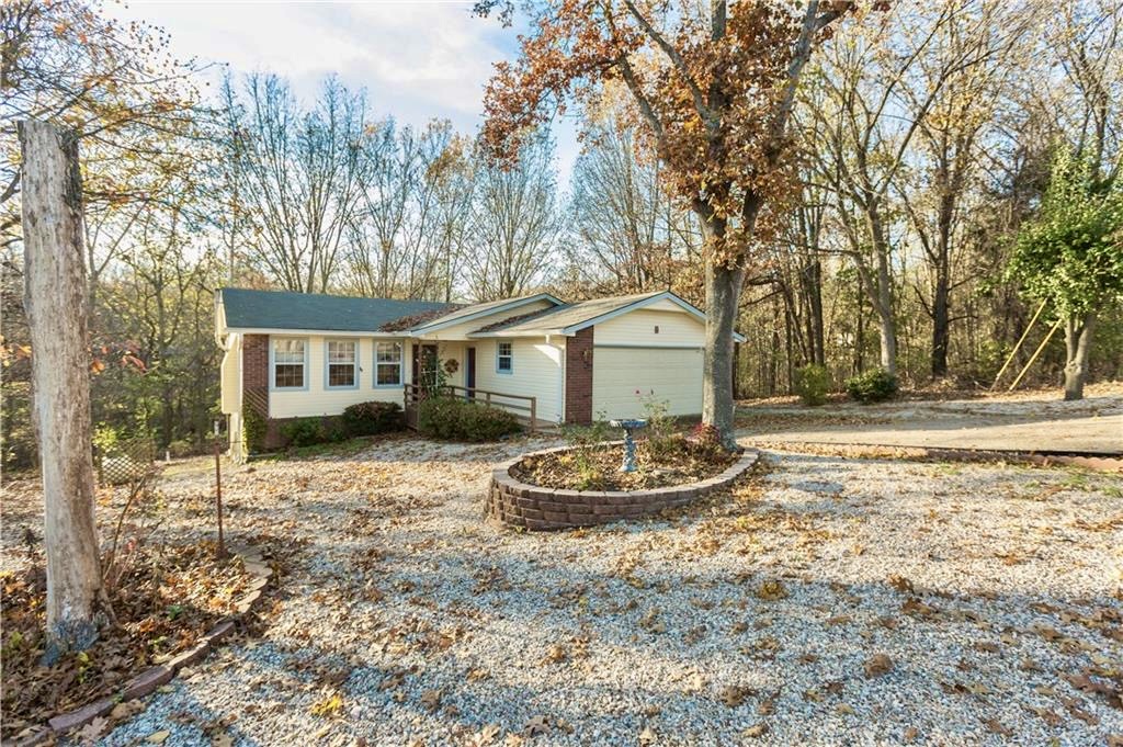 Welcome to a home that fits the NWA outdoor lifestyle. Located just north of Lake Avalon beach, this property is an exceptional find, serving beautifully as a starter home, an effortless rental, or a high-upside investment opportunity.
Enjoy the best of both worlds: convenient travel with quick access to 71B and I-49, paired with the ultimate outdoor lifestyle. Mountain biking enthusiasts will be thrilled by the location, which sits right where the famous "Bamboozled" trail connects with the "Lago Vista Gravity Line."
Beyond the trails, you'll be plugged into the vibrant Bella Vista community, complete with six golf courses, country clubs, pools, and premier recreation centers. Discover the full suite of amenities at bellavistapoa.com and come imagine the possibilities!