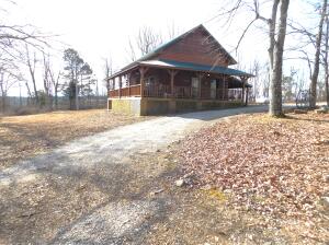 This 1068 SQ FT, 2 BR 2 BATH Log Cabin on 3.26 acres with a great view, end of the road, just a short distance off Hwy 21 in the Mossville Community near Boxley in Newton County. Open floor plan with vaulted ceilings. Large loft with a bathroom that could be made into additional bedrooms. Full length covered deck on the front with great views. All wood interior. Central HVAC, rural water and high speed internet. It is rare to find this setting near the Ozark National Forest and the Buffalo National River. Other things that make this property special is it is only 1.6 miles from Smith Creek Preserve Trail Head, 4.8 mile from Magnolia Fall trail head and 8.3 mi from Glory Hole trail head.