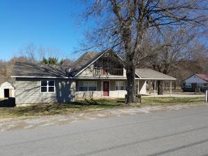 Home has hardwood floors, new windows, 2 living areas, 2 bathrooms, 4 bedrooms, basement and attic storage. Home has a lot to offer. Home is offered AS IS no repairs. Convenient to get Hwy 412, Berryville, green Forest, Harrison, or Branson. Buyers responsible for utilities  to be turned on for any inspections.