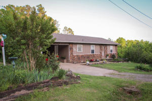 This beautifully landscaped home is ready for its next owner! It's just minutes away from the lake, nuclear plant and elementary school. Nice shop with electricity, a large deck, open kitchen and new roof in 2016 are just a few of the features that set this home apart from the rest.