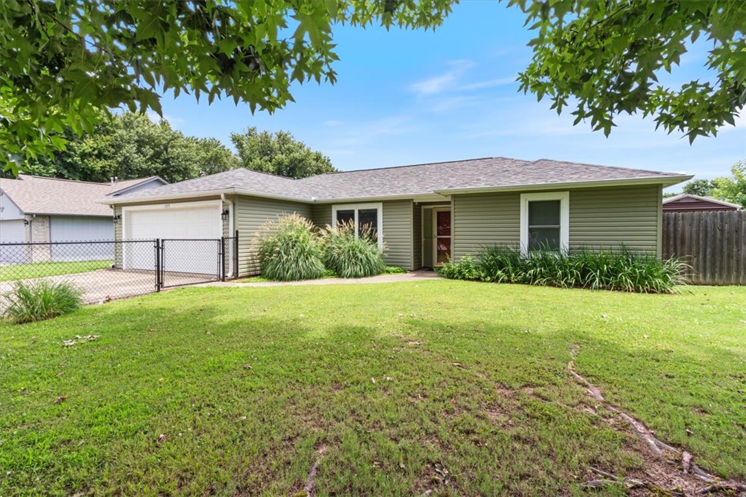 Perfect for first-time homebuyers, young couples, or small families! This well-maintained 3-bedroom, 2-bath home offers approximately 1,099 sq. ft. of comfortable living space with newer vinyl flooring and fresh paint throughout. The functional floor plan provides a warm and inviting atmosphere, ready for you to move right in. Step outside to enjoy the nice fenced backyard—ideal for kids, pets, or entertaining—and a convenient storage shed for lawn equipment or extra storage. Located in a great setting, this affordable home is a wonderful opportunity to start building equity instead of renting. Don't miss your chance to make this charming home your own—schedule your showing today!