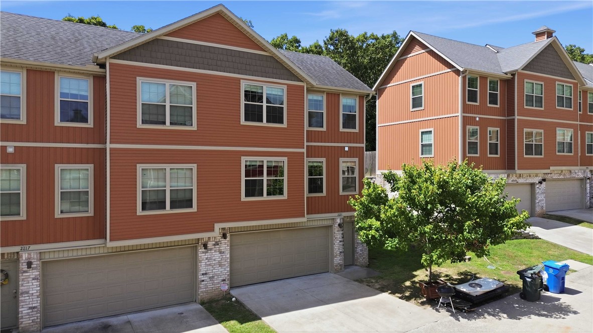 Very well maintained townhouse in the heart of NWA! Minutes from the U of A, Fayetteville High school, Ramey Jr high, John Colbert Middle school, shopping, dining and entertainment.  This 2 bedroom 2 1/2 bath townhouse is perfect for anyone whether you are an investor, young professional or family ready to enjoy a maintenance free lifestyle.  End unit(rare) with 2 car garage, LVP flooring, granite counter tops, spacious living and dine-in kitchen area. Enjoy your morning coffee or evenings on the private deck !
