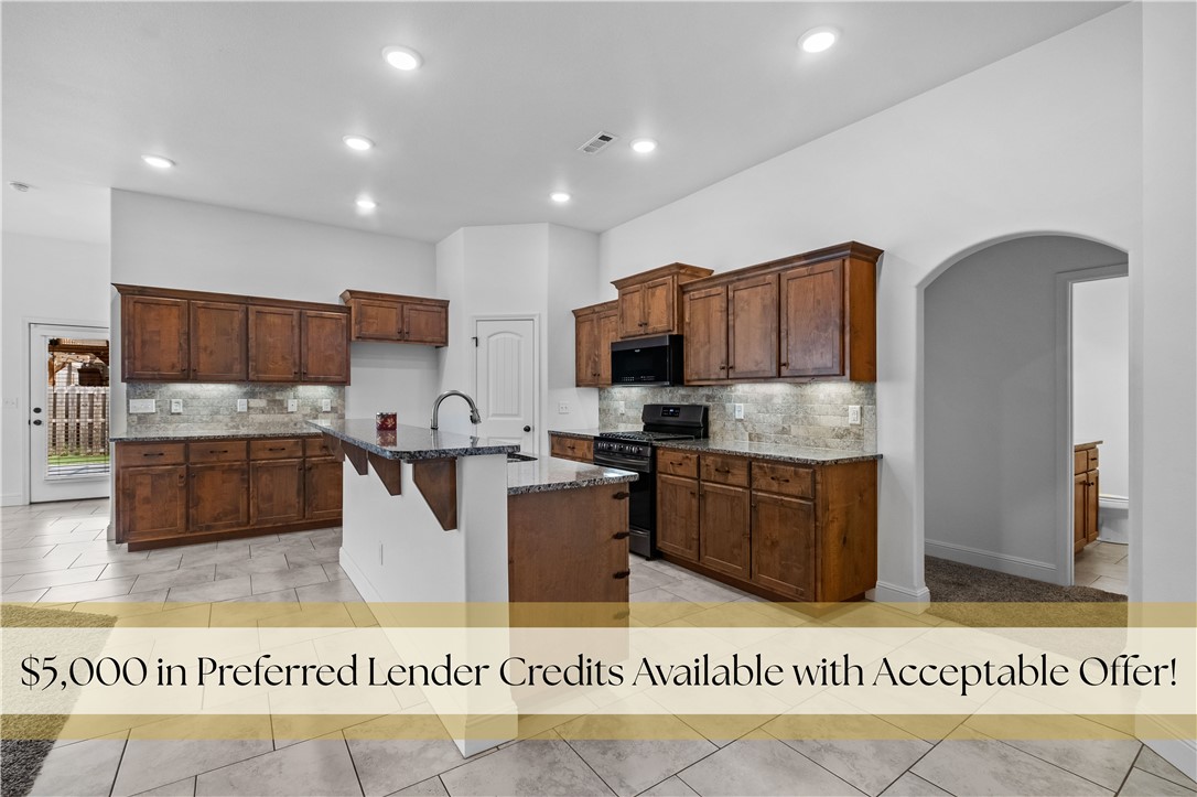 $5,000 Preferred Lender Credit Available! West-facing and beautifully maintained, this single-story four-bedroom, two-bath home offers the perfect blend of comfort and functionality. The open floor plan creates a natural flow between the living, dining, and kitchen areas, making the space ideal for both everyday living and hosting guests. The living room features convenient built-in floor outlets, while the kitchen showcases granite countertops and stylish finishes. Step outside to enjoy a backyard designed for relaxation, complete with a stamped concrete patio and pergola—perfect for quiet evenings or weekend gatherings. Situated on the edge of town, the location offers a peaceful setting while remaining close to shopping, dining, and daily conveniences. Residents also enjoy neighborhood amenities including separate dog parks for large and small dogs, adding to the sense of community and outdoor lifestyle.