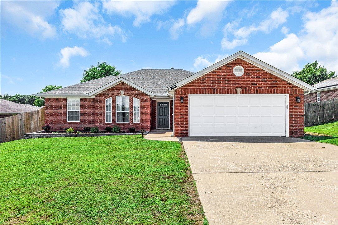 Oh my gosh, you found YOUR house! 511 Dewberry Lane in Centerton's Centerpoint neighborhood — seriously, it's perfect for you! It's a solid brick, single-story 3-bedroom, 2-bath with 1,614 square feet in the Bentonville School District. The split floor plan gives everyone their space, there's a cozy fireplace in the living room, all appliances convey, and you'll absolutely love the walk-in closets. But here's the best part — the big stuff is already done! Newer HVAC, roof, gutters, water heater, LVP flooring, and fresh paint throughout. You're not walking into a project, you're walking into a move-in ready home! The wood-privacy fenced backyard with a covered patio is perfect for the kids and the dog. There's a 2-car attached garage, ceiling fans throughout, and the lot is level and sits near parks and schools. The architectural shingle roof, concrete slab foundation, and brick exterior mean this home is built to last. You know how you always said you wanted something move-in ready? This is literally it.