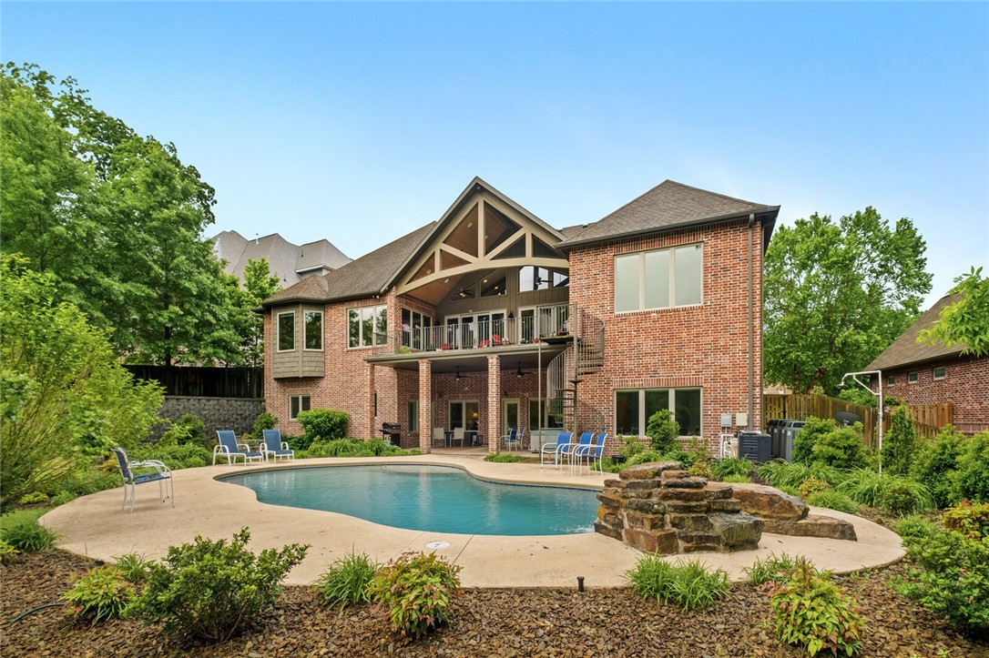 DREAM BECAME REALITY. First time on market: expansive home w/ saltwater pool, chef kitchen, dual master suites, & easy access to CB and trail system. You’ll love view overlooking heated pool watching everyone splash around. Enjoy cooking- gourmet kitchen -6 burner cooktop, 2 ovens, large prep island & pantry for meal prep. Main level also boasts of 2 masters, guest bed, main level media, butler pantry/ kitchen office & serving bar. Spacious laundry with pet shower. Downstairs for entertainment and your imagination. Prep pool day in downstairs bar area. Pool changing area with lockers, indoor & outdoor living, 2 bed 2 bath, second media room perfect for late night movies, office, safe room, & more. Additional 2194 SF heated & cooled flex space not included in total SF.