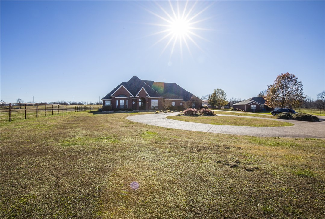The best of the best luxury meets country setting. 4.09 acres, a 5000 sq. ft. barn, saltwater pool, this home offers 5 bedrooms, 4.5 baths. Soaring ceilings and views you only dream about. Family room, eat-in kitchen and a formal dining room. Upstairs a Bonus room , kitchenette and full bath. Walk thru garage and open the door to a living area or office/bedroom and full bath. Great for an in-law suite. Bentonville Schools, 20 minutes to the Corporate headquarters for Walmart. Hurry the crickets are waiting for you to listen to their music. A one of a kind property. Call me for a private showing.