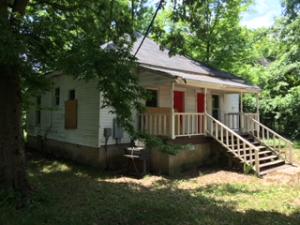 Fix it up your way. Owner will consider owner financing with acceptable down payment and terms. 2 bedroom with possible 3rd. adjoining lot possibly for sale also.