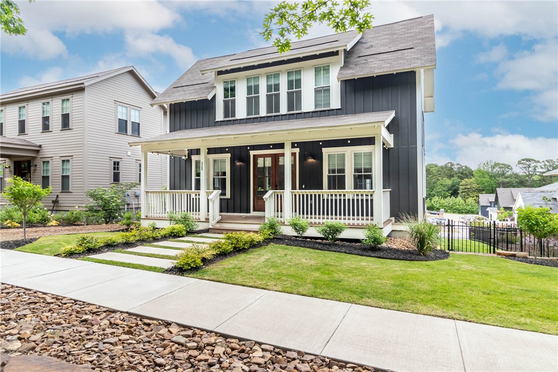 Located just blocks from the UofA, Bud Walton, Razorback Stadium, The Stonebreaker, + I-49. This 4 bdrm, 2.5 bath home offers 2,661sf of thoughtfully designed living space in one of Fayetteville’s most sought-after locations of Markham Hill! The perfect blend of style, comfort, + convenience. Step inside to find hardwood floors, an open layout, & high-end finishes. Oversized 2 car garage w/ additional off street parking. Appointed w/ elegant Roman shades on all windows + a premium built in Sonos sound system sets the perfect mood in each room. A sump pump adds peace of mind, + with an acceptable offer, the refrigerator, washer, & dryer will convey. The exterior features an iron fence, sprinkler system w/ controller, extensive landscaping, string lights on front + back deck—ideal for evening entertaining, + freshly stained front porch, back deck, + stairway. This home combines modern upgrades w/ timeless style in a prime location. Don’t miss your chance to own this exceptional property in the heart of Fayetteville.