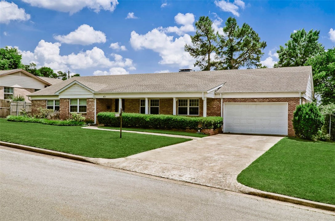 Highly desired Wilson Park home has 2806SF on one level! This house lives large with 4 spacious bedrooms and 2 updated bathrooms. Entertain family or guests with 2 oversized living rooms and open eat in kitchen. Fantastic patio doors lead to a covered back patio where you can BBQ, play, and enjoy the landscape. Located close to the Razorback Greenway, and the University of Arkansas. This home is ready for a new family to love!