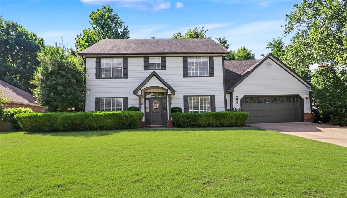 This well-maintained residence offers an inviting home in a desirable neighborhood at an attractive price point. Presented for the first time in twenty-five years, it is ready for new ownership. Recent updates include replacing the Masonite siding with Hardy Board siding in 2025 and a new main level HVAC unit in 2026. The main level comprises a formal living room, formal dining room, den with fireplace, eat-in kitchen, sunroom, and powder room. Upstairs features an oversized primary bedroom suite with a study area & spacious walk-in closet, three guest bedrooms—one of which has an ensuite bathroom, and a guest hall bathroom. Outdoor entertaining space extends off the sunroom, overlooking a large, fully fenced, tree-shaded backyard. Situated on a generous corner lot, the property offers convenient access to Boardwalk amenities.  Extra workshop/storage room in garage. The home has been meticulously maintained, inside and out. Flowerbeds have recently been mulched and are visually appealing. This is your new home!