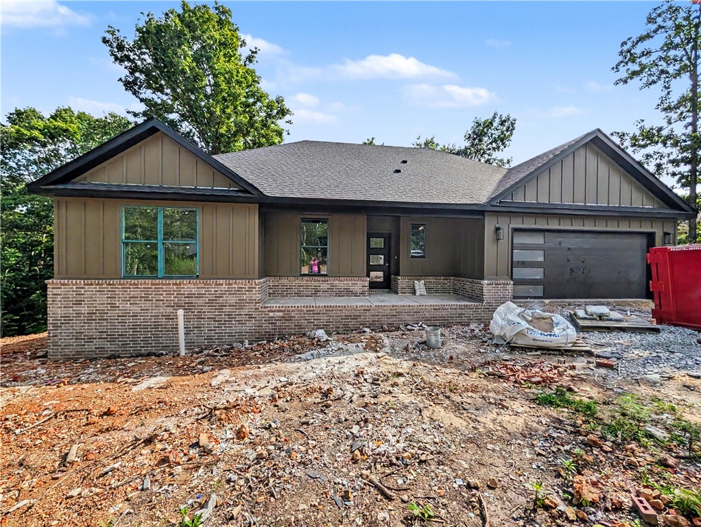 Welcome To Your Next Home, The Birch Plan. Three Beds, Two And A Half Baths, And 1,662 Square Feet Of Living That Opens Up The Moment You Walk In, With A Vaulted Ceiling And Beams Overhead And A Corner Fireplace Anchoring The Living Room. The Kitchen Holds Its Own With Custom Cabinets, Granite Counters, Tile Backsplash, Under Cabinet Lighting, A Pantry, And Bar Seating + Eat In Dining. The Split Floor Plan Keeps The Primary Suite Off On Its Own With Its Own Vault, Dual Vanity, Walk In Closet, A Private Water Closet, And A Custom Tile Shower. The Two Secondary Bedrooms And Full Hall Bath Sit On The Far Side Of The House. And Yes, A Half Bath, A True Unicorn At This Size, So Dinner Company Gets Their Own Throne And Nobody Is Frantically Hiding The Toothbrush Before They Arrive.  Coffee On The Covered Front Porch, Evenings On The Covered Back Deck In The Trees, And A Sodded, Landscaped Yard To Come Home To. Branchwood Nature Trail, Golf, And The Rec Center Are All Right Around The Corner. Wrapping Up Late July.