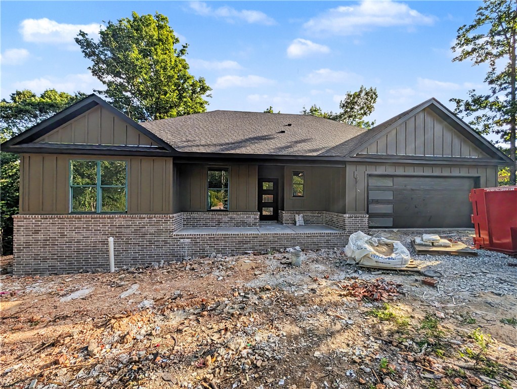 Welcome To Your Next Home, The Birch Plan. Three Beds, Two And A Half Baths, And 1,662 Square Feet Of Living That Opens Up The Moment You Walk In, With A Vaulted Ceiling And Beams Overhead And A Corner Fireplace Anchoring The Living Room. The Kitchen Holds Its Own With Custom Cabinets, Granite Counters, Tile Backsplash, Under Cabinet Lighting, A Pantry, And Bar Seating + Eat In Dining. The Split Floor Plan Keeps The Primary Suite Off On Its Own With Its Own Vault, Dual Vanity, Walk In Closet, A Private Water Closet, And A Custom Tile Shower. The Two Secondary Bedrooms And Full Hall Bath Sit On The Far Side Of The House. And Yes, A Half Bath, A True Unicorn At This Size, So Dinner Company Gets Their Own Throne And Nobody Is Frantically Hiding The Toothbrush Before They Arrive.  Coffee On The Covered Front Porch, Evenings On The Covered Back Deck In The Trees, And A Sodded, Landscaped Yard To Come Home To. Branchwood Nature Trail, Golf, And The Rec Center Are All Right Around The Corner. Wrapping Up Late July.