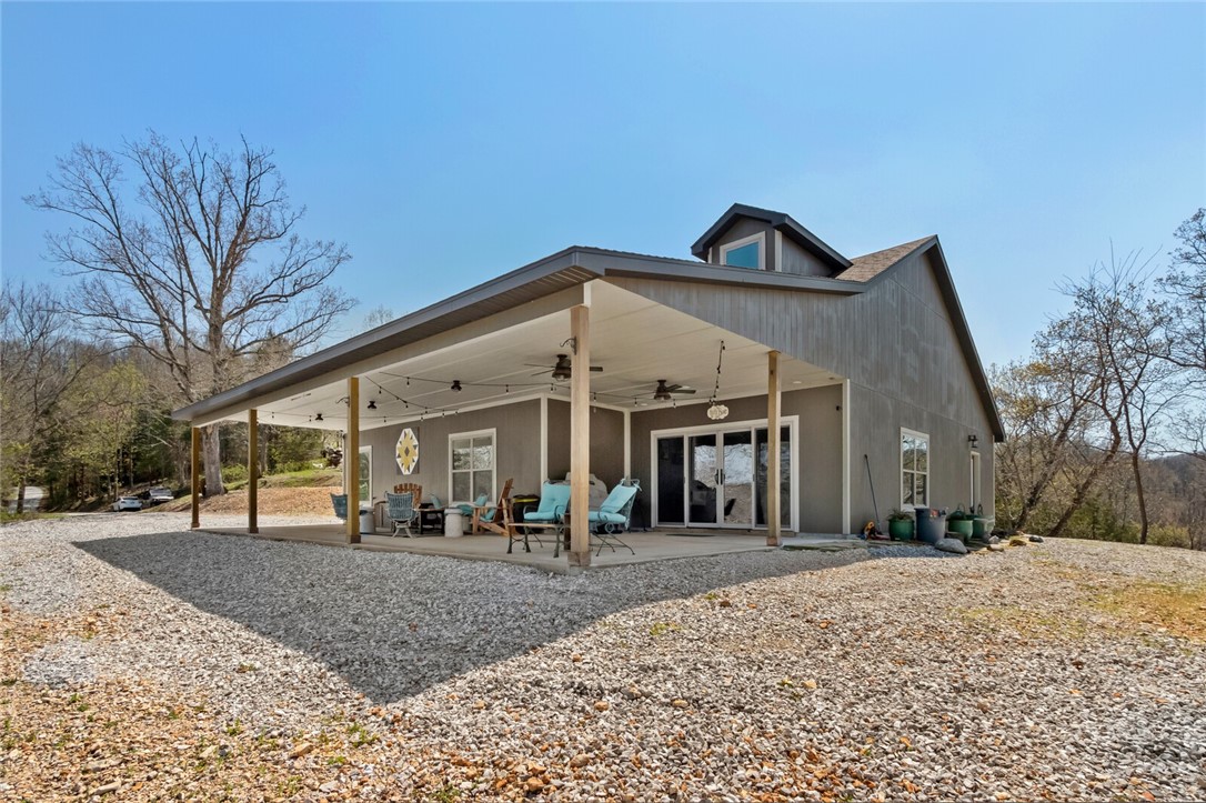A rare find on Beaver Lake in this almost new lakeview home on 27 acres with a private dock!  Immaculate 3 bedroom, 2 bath home with beautiful views, space to spread out and a one (24') slip private dock down the hill. There are a few additional potential home sites or you can enjoy the privacy of the acreage.  Roads are paved all the way to the driveway.