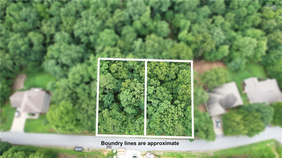 Lots 14 & 15 – Bridlington Drive are two builder-ready lots totaling 0.60 acres combined in the desirable Lake Ann area of Bella Vista! One lot is perked for a 3 bed/2 bath home, & both are fully surveyed with completed septic designs, making them ready for immediate construction. Nestled in a serene, wooded, & private setting along Bridlington Drive in the established York Subdivision, these lots offer excellent potential for a custom dream home with a potential walk-out basement, spacious yard, workshop, or guest space. Enjoy the full Bella Vista POA lifestyle with 7 golf courses, 7 lakes (including nearby Lake Ann), over 100 miles of trails (Back 40 and Flo Ride right nearby), pools, parks, tennis/pickleball, and fitness centers. Conveniently located with easy access to Bentonville, Rogers, and I-49, this is your chance to build in paradise in one of Northwest Arkansas’s most sought-after communities.
Contact us today for surveys, plats, pit test, and septic details. All information is for the 2 lots combined.
